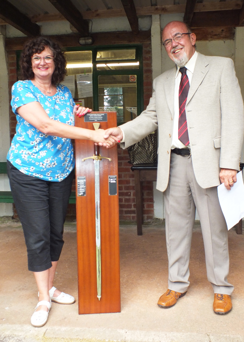 Photograph shows SSRA Chairman - Richard Tilstone (pictured right), presenting the Wilkinson Sword to SSRA Treasurer - Judith Simcock (pictured left).