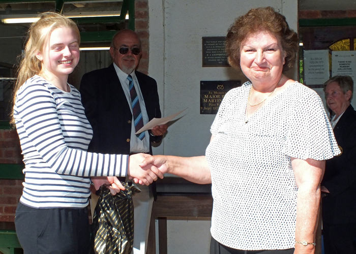 Photograph shows Helen Robinson (pictured left) receiving the Staffordshire Open Prize - Top Lady Award from Mrs. Janet Troke (pictured right).
