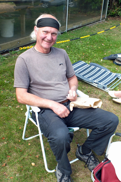 Photograph shows Paul Watkiss enjoying a well deserved sit down after a hectic day's shooting.