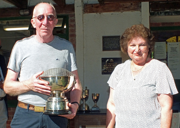 Photograph shows Mrs. Janet Troke (pictured right), presenting the K. Madeley Rose Bowl to Steve Rowe (pictured left).