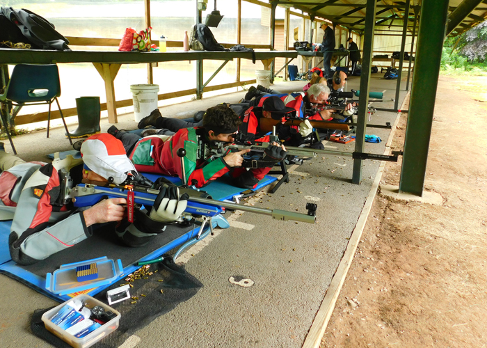 Photograph shows a fine group of shooters - cool, calm and collected - at least for now.