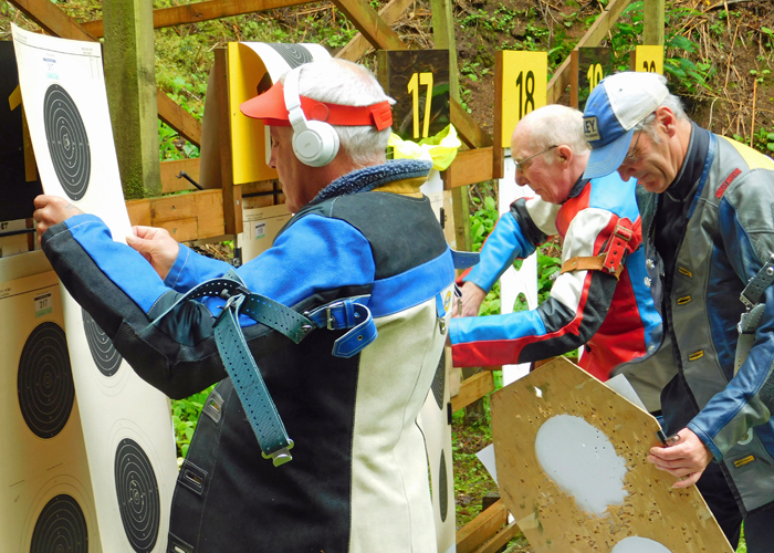 Photograph shows the hive of activity at the end of a detail, as competitors change their targets.