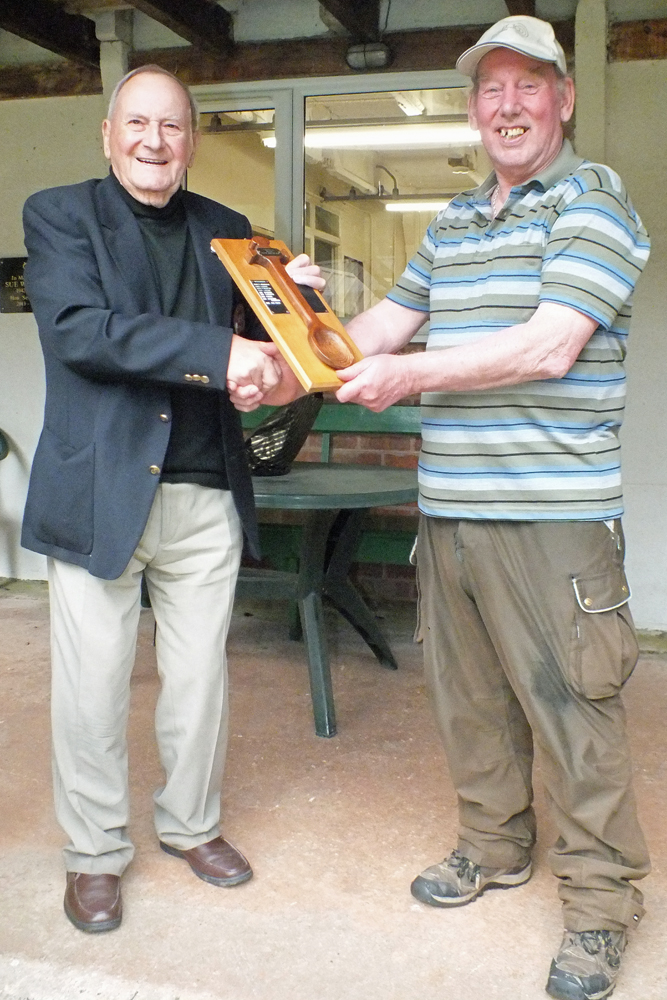 Photograph shows SSRA President - Mike B.P. Willcox (pictured left), presenting the Wooden Spoon for 2024 to Brian Parker (pictured right).