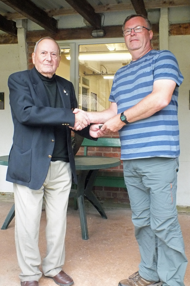 Photograph shows SSRA President - Mike B.P. Willcox (pictured left), presenting the NSRA County Silver Medal to Dave Glover (pictured right).