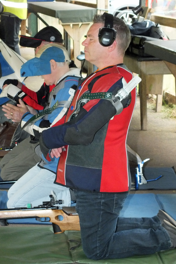 Photograph shows a competitor taking the time to relax and calm himself down ... and maybe even offer a little prayer to the shooting gods above!