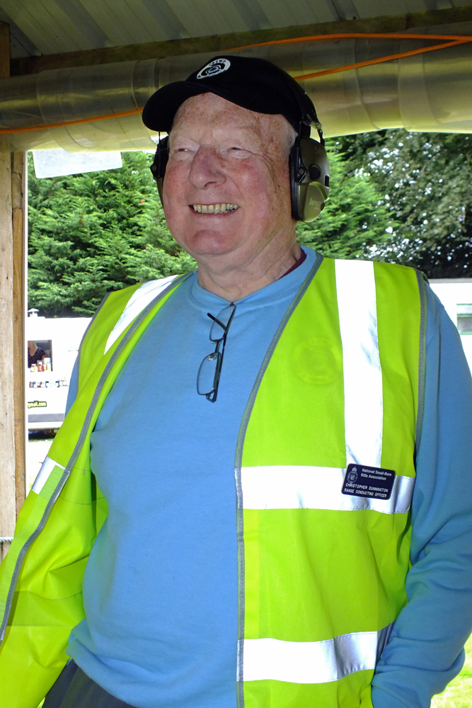 Photograph shows another member of the Range Officer Team, as he prepares to take control of the next detail.