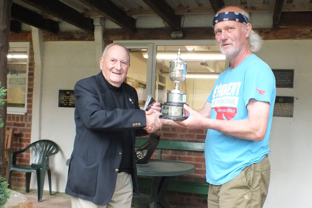 Photograph shows SSRA President - Mike B.P. Willcox (pictured left), presenting the E.J. Chipperfield Cup for 2024 to Paul Watkiss (pictured right).