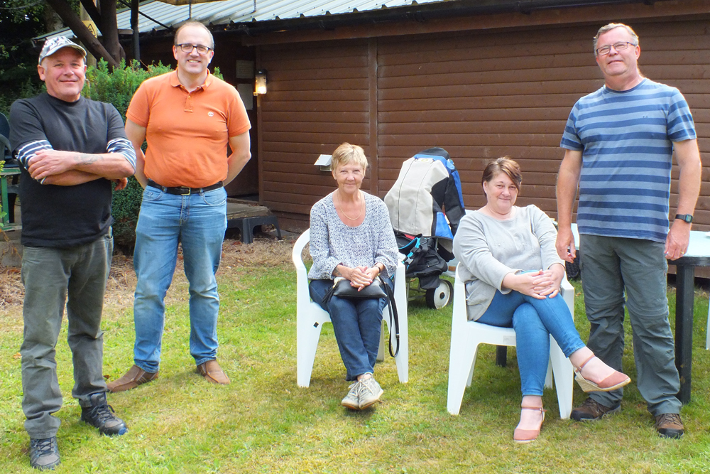 Photograph shows a group of friends and family, including Dave Glover (pictured right) and Graham Delaney (pictured left) chilling before the heat of battle.