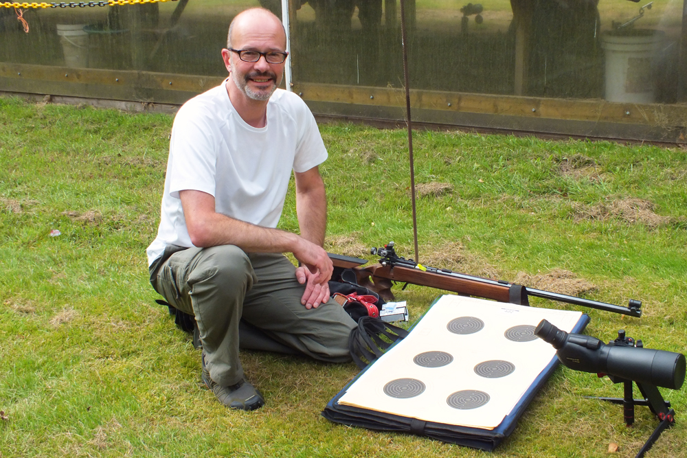 Photograph shows Alan Williams displaying his kit prior to the commencement of his detail.