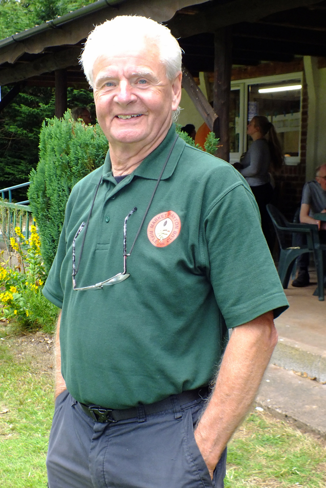 Photograph shows Tony Errington taking a well earned break outside the clubhouse, after a long and eventful day checking targets.