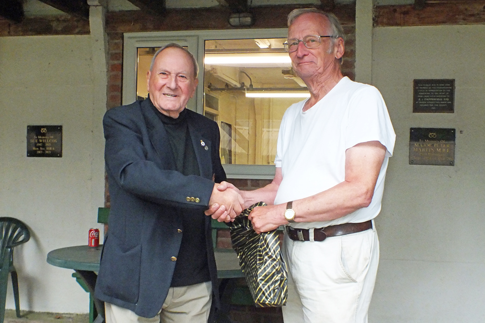 Photograph shows SSRA President - Mike B.P. Willcox (pictured left), presenting the Staffordshire Open - Class C 2nd Place Prize to Vic Tyne (pictured right).