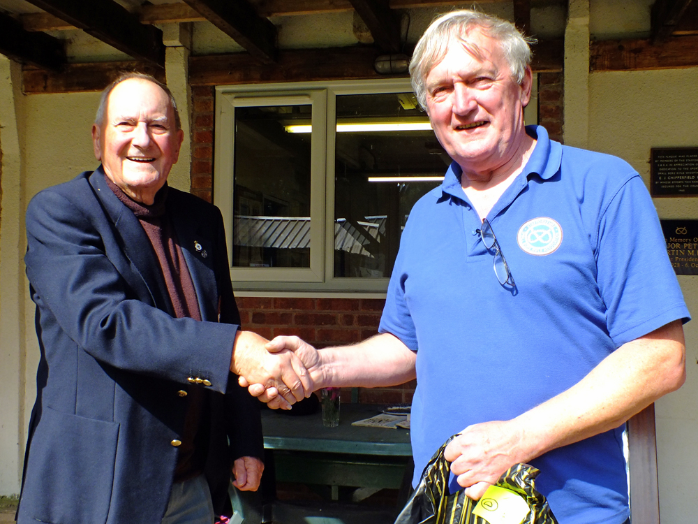 Photograph shows SSRA President - Mike B.P. Willcox (pictured left), presenting the Staffordshire Open - Class D - 1st Place Prize for 2025 to Alan Boyles (pictured right).