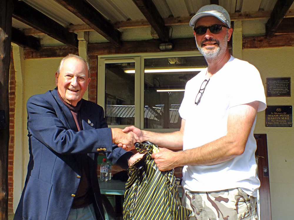 photograph shows SSRA President - Mike B.P. Willcox (pictured left), presenting the Staffordshire Open - Class D - 2nd Place Prize for 2025 to Alan Williams (pictured right).