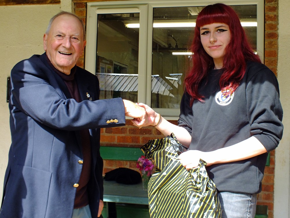 Photograph shows SSRA President - Mike B.P. Willcox (pictured left), presenting the Staffordshire Open - Class C - 1st Place Prize for 2025 to Olivia Kirkland (pictured right).