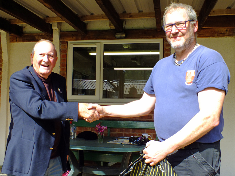 Photograph shows SSRA President - Mike B.P. Willcox (pictured left), presenting the Staffordshire Open - Class C - 2nd Place Prize for 2025 to Paul Baron (pictured right).