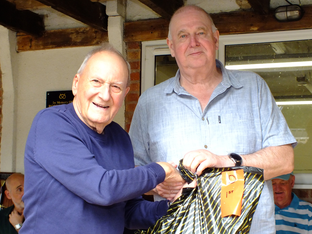 Photograph shows SSRA President - Mike B.P. Willcox (pictured left), presenting the Staffordshire Open - Class D - 1st Place Prize for 2026 to Ivor Leigh (pictured right).