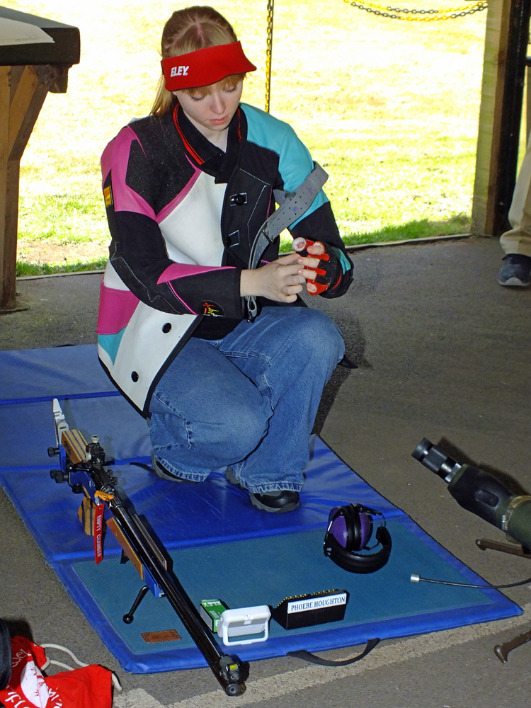 Photograph shows Phoebe Houghton settling in on the firing line, cool, calm and collected.