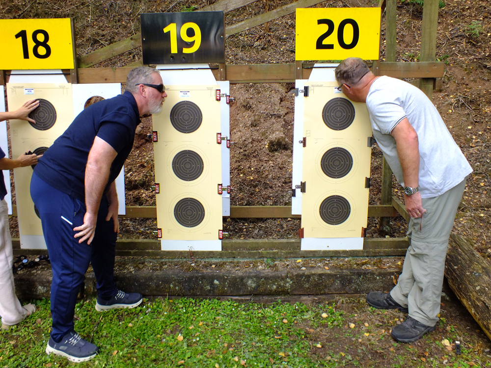 Photograph shows Martyn Buttery (pictured left) and Dave Glover (pictured right) each planting a 'kiss for luck' on their respective targets, and they're on their way! All that is missing is The Carpenters singing 'It's Only Just Begun' ... but wait ... what do I hear!